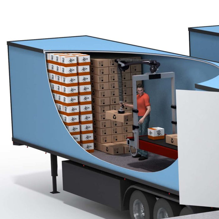 Vista ampliada del proceso de descargue de cajas dentro de un contenedor, utilizando el manipulador de cargas telescópico integrado.